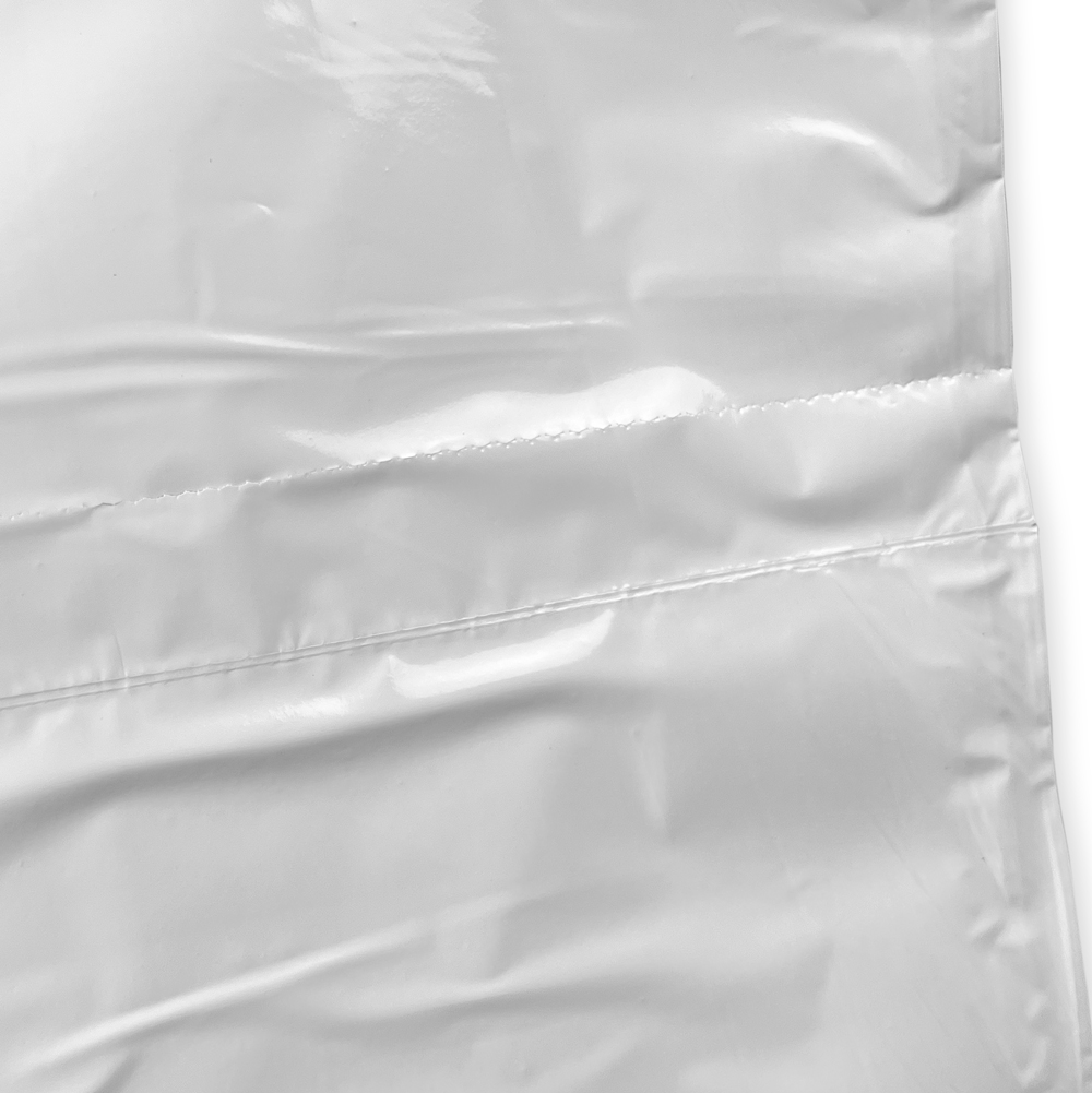 Close up of 33 Gallon Heavy Duty Trash Bags - 0.9 Mil - 150 per case Bottom Seal and Perforation
