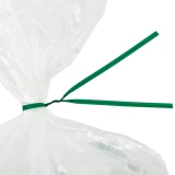 Close up of 10 Inch Green Plastic Twist Ties Tied on Bag