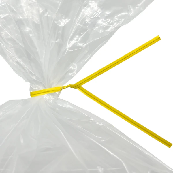 10 Inch Yellow Paper Twist Ties Tied on Bag Close up of 10 Inch Yellow Paper Twist Ties Tied on Bag