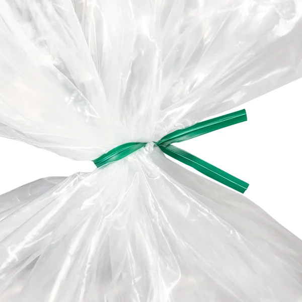 4 Inch Green Plastic Twist Ties Tied on Bag Close up of 4 Inch Green Plastic Twist Ties Tied on Bag