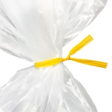 Close up of 4 Inch Yellow Plastic Twist Ties Tied on Bag