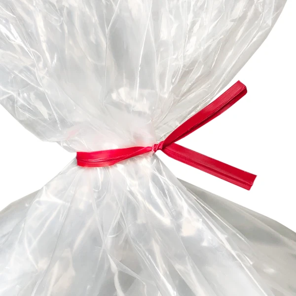 4 Inch Red Plastic Twist Ties Tied on Bag - 1000/Pack Close up of 4 Inch Red Plastic Twist Ties Tied on Bag - 1000/Pack