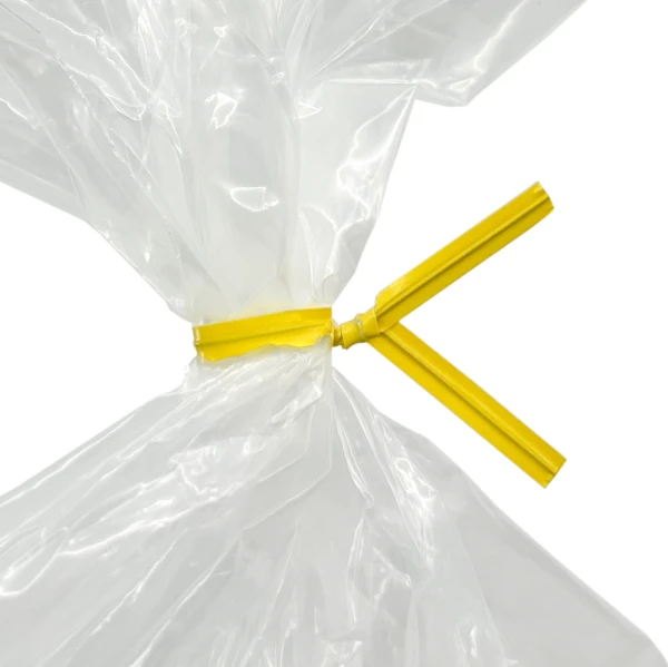 4 Inch Yellow Paper Twist Ties Tied on Bag Close up of 4 Inch Yellow Paper Twist Ties Tied on Bag