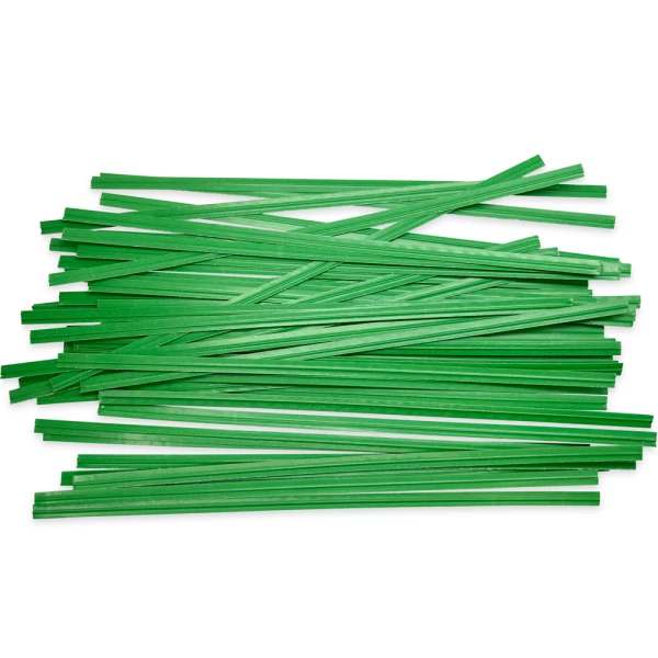 Group of 6 Inch Green Paper Twist Ties Scattered Out