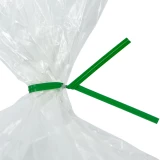 Close up of 6 Inch Green Paper Twist Ties Tied on Bag