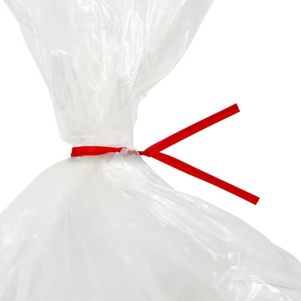 6 Inch Red Plastic Twist Ties Tied on Bag - 1000 per Pack Close up of 6 Inch Red Plastic Twist Ties Tied on Bag - 1000 per Pack