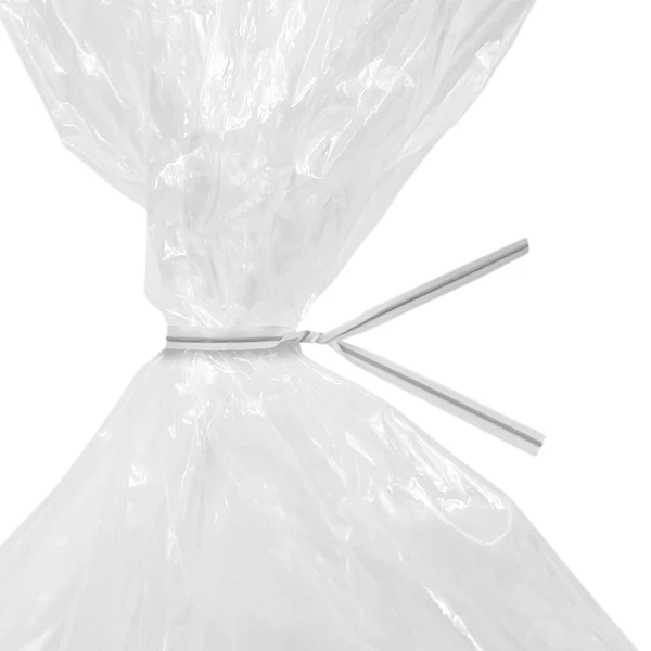 6 Inch White Plastic Twist Ties Tied on Bag Close up of 6 Inch White Plastic Twist Ties Tied on Bag