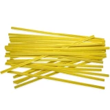 Group of 6 Inch Yellow Paper Twist Ties Scattered Out