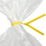 Close up of 6 Inch Yellow Paper Twist Ties Tied on Bag