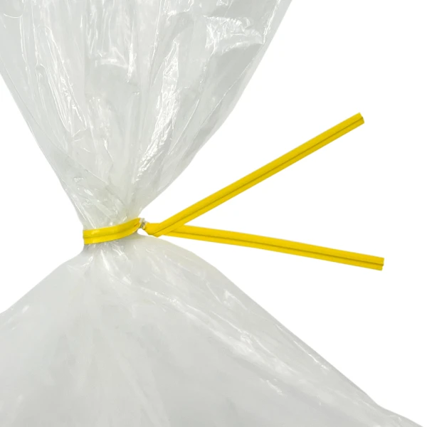 8 Inch Yellow Paper Twist Ties Tied on Bag Close up of 8 Inch Yellow Paper Twist Ties Tied on Bag
