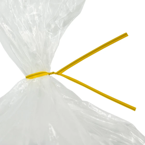 8 Inch Yellow Plastic Twist Ties Tied on Bag Close up of 8 Inch Yellow Plastic Twist Ties Tied on Bag