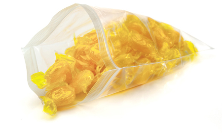 Lightweight ziplock bag with yellow candy spilling out