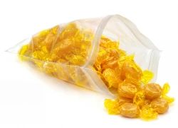 1.25 Mil Zip Locking Bags Lightweight ziplock bag with yellow candy spilling out